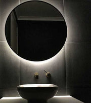 Backlit mirror over vanity