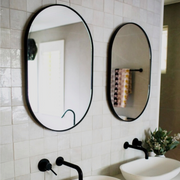Bjorn Oval mirrors above twin vanity unit
