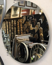 Frameless Round Mirror hanging out with friends in our shop