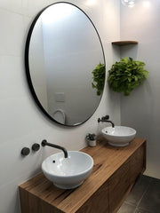 Modern Circular Round Mirror in a bathroom