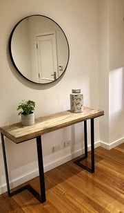 Modern Circular Mirror, above a side table