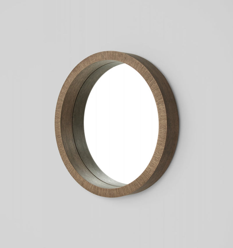 Beautiful, elegant round mirror with a stand out wooden frame. 