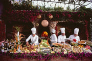Kitchen staff preparing a feast at Il San Pietro di Positano Hotel, Italy, 1984 — Slim Aarons