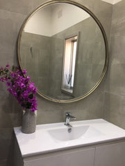 Looking Glass Mirror in Silver in a room