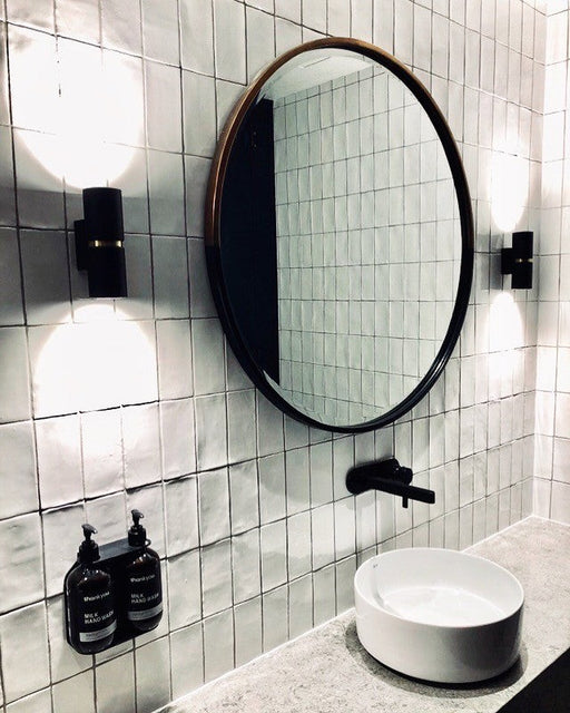 Brass & Black in a bathroom