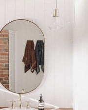 Bjorn Brass Oval Mirror, In Situ